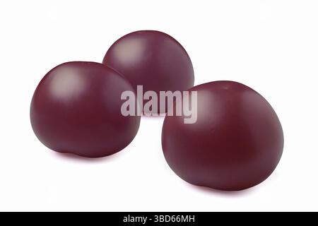Three purple tomatoes isolated on white background Stock Photo