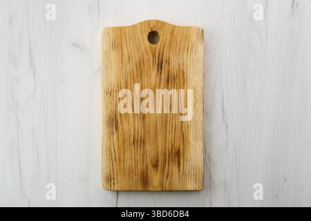 Overhead view of wooden cutting board Stock Photo