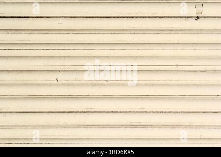 Close-up of a cream-coloured timber wall abstract texture background Stock Photo