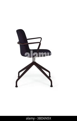 this studio shot showcases a modern office chair featuring dark fabric upholstery and a brown metal frame the chairs design is contemporary Stock Photo