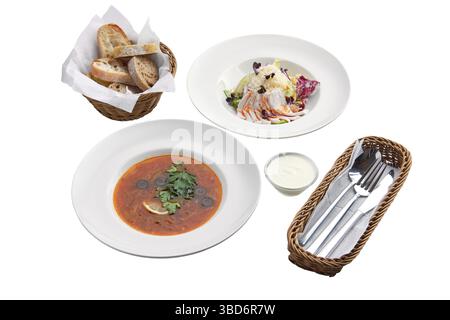 Solyanka soup and salad with cabbage and ham isolated on white background Stock Photo
