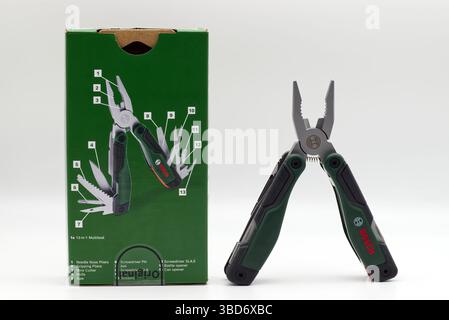 Bologna - Italy - May 16, 2025: Bosch multitool isolated on white. Stock Photo