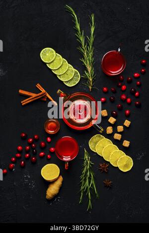 Composition with tonic drink with cranberry, ginger, lemon, honey and mint Stock Photo