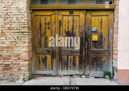 Rural Entry — Worn Door Frame with Mailbox Stock Photo