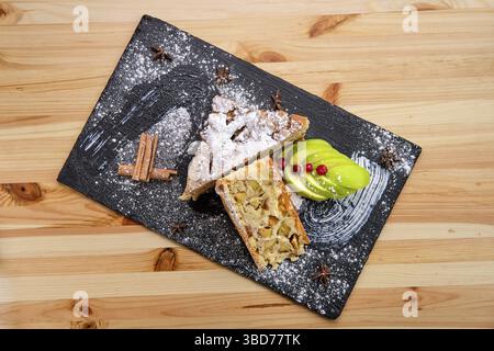 Apple pie on slate plate top view Stock Photo