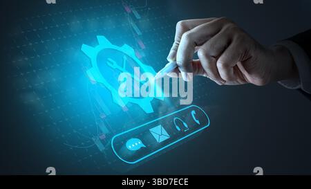 Businessman touching the icon of a gear with wrench and screwdriver tools. Technology innovation on a virtual screen. Concept of technical support or Stock Photo
