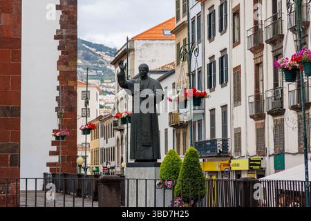 Funchal, Portugal - June 9, 2024: Statue of John Paul II in front of Cathedral of Our Lady of the Assumption in Funchal city Stock Photo
