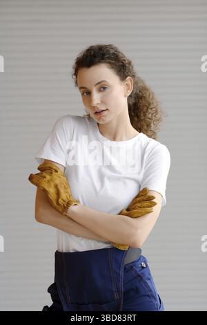 Portrait of confident woman in uniform, small business concept Stock Photo