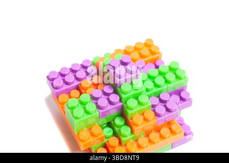 Colorful plastic construction blocks Children's construction kit. Education concept Stock Photo