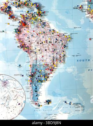 world map isolated on south america australia with multi coloured pins Stock Photo