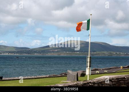 Irish flag on the beach of An Coirean-Waterville, Ireland Stock Photo