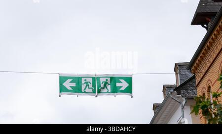 Exit sign on the street. Emergency information sign in big city. Stock Photo