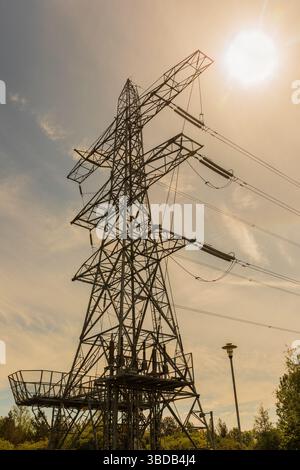 High voltage pylon against the sky Stock Photo