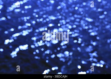 Blurred background, water surface, bokeh blurred background, glittering water surface, bokeh Stock Photo