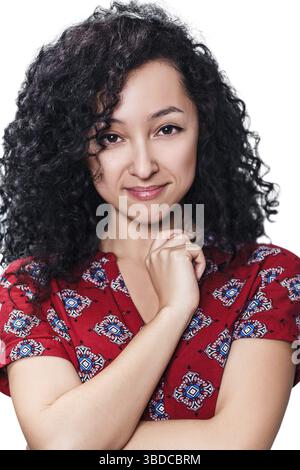 Young happy woman with curly black hair over white background Stock Photo