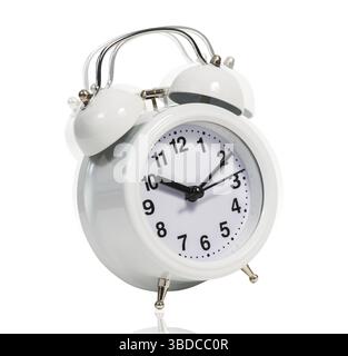 Classical alarm clock ringing on the white background Stock Photo