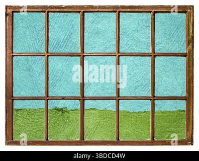 Green field and blue sky as seen from a vintage sash window, abstract landscape created with colorful sheets of textured handmade paper Stock Photo