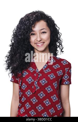 Young woman smiling with curly black hair isolated on white Stock Photo