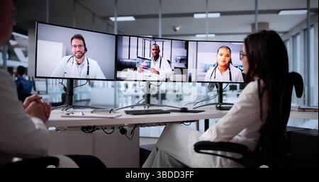 Virtual Medical Team Meeting: Doctors And Nurses Using Telehealth Stock Photo