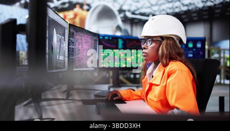 Female Engineer Developing Satellite Model Using 3D CAD Design Software Stock Photo