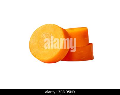 Side view of three orange carrot slices in circles in stack is isolated on white background with clipping path. Stock Photo