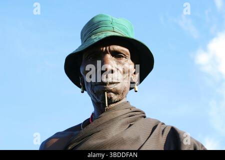 Toposa man with lip peg and hat, Nyanyagachor, Sudan, Toposa-Man with lip peg and hat, Nyanyagachor, Sudan Stock Photo