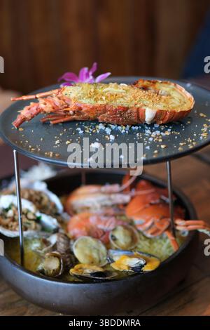 two-tiered luxury platter of lobster and seafood crabs shrimp ...