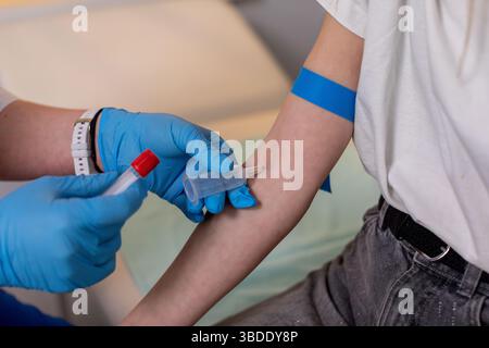 Understanding the Blood Draw Process and its Importance in a Medical Setting for Diagnosis and Care Stock Photo