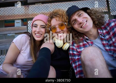 Group of trendy friends taking a selfie outdoors Stock Photo