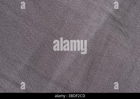 woven material, canvas texture, background wallpaper for projects, visible weave in gray color Stock Photo