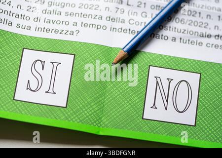 Yes and No on a green ballot paper or slip for one of the five questions of 2025 Italian popular referendum, officially Abrogative Referendums, Italy Stock Photo