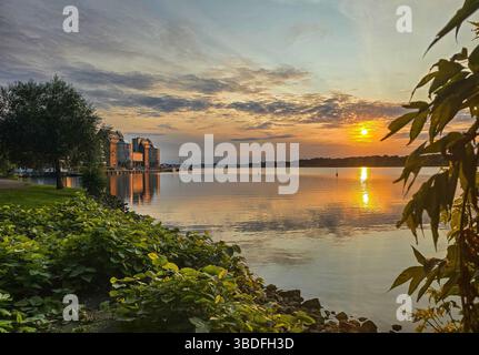 sunset over the river warnow in rostock, germany Stock Photo