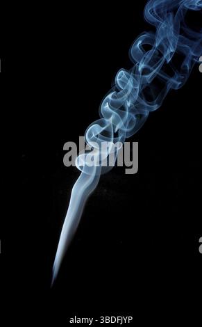 Abstract smoke in blue on a black studio background Stock Photo