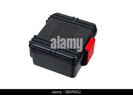Black hard plastic protective case with red latch, isolated on white background. Stock Photo