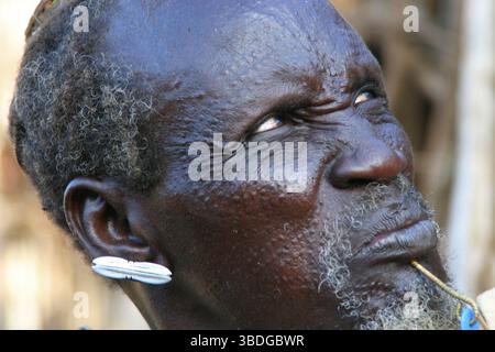 Toposa Man with lip peg and decorations scars, Nyanyagachor, Sudan, Nyanyagachor, Nyanyagachor, Sudan Stock Photo