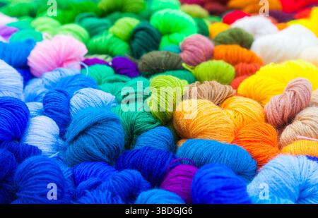 Yarn. Background from multi-colored threads for knitting closeup. Stock Photo
