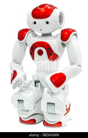 AI small red robot with human face and body isolated on white background. Humanoid. Artificial Intelligence. Stock Photo
