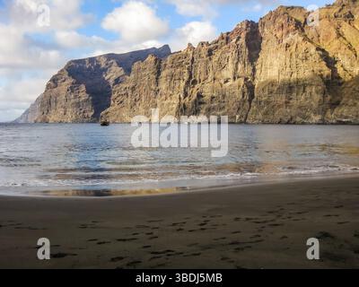 Los Gigantes beach, Tenerife, Canary Islands, Spain. Giant cliffs overlooking the Atlantic Ocean on the west coast of Tenerife with pirate sailing shi Stock Photo