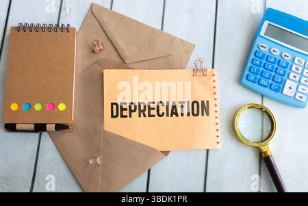 Depreciation is shown using a text and charts. Stock Photo