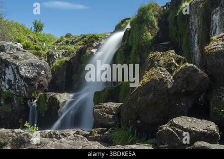 A view of the Upper Falls of the Loup of Fintry in the central lowlands of Scotland Stock Photo
