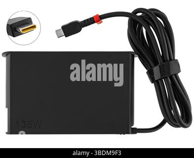 Classic laptop power supply with black cable. Perfect for catalogs and online electronics stores. Stock Photo