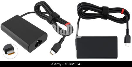 Classic laptop power supply with black cable. Perfect for catalogs and online electronics stores. Stock Photo