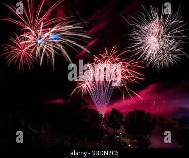 Firework display on the night sky at a festival Stock Photo