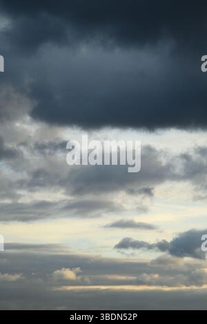Aesthetic neutral photo. Vertical photo of blue clouds in cloudy weather. Stock Photo