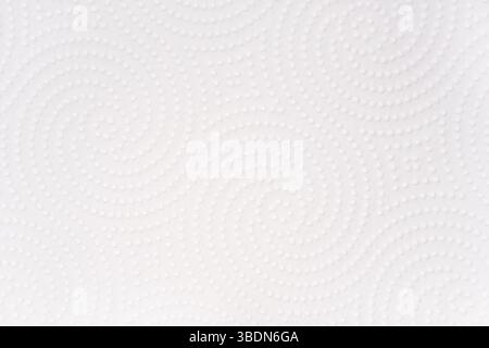 The texture of a white paper towel. Macro. Soft, delicate paper. Stock Photo