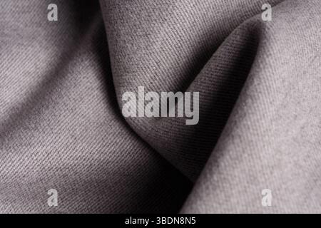 Tweed fabric, wool, gray herringbone textile background. Textiles. Banner for advertising goods for creativity. Stock Photo