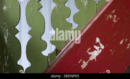 Old staircase detail painted red and green Stock Photo