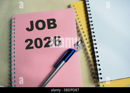 Concept of Job 2026 write on book isolated on Wooden Table. Stock Photo