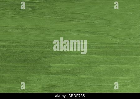 Green painted wooden board background. Green rough wooden surface with grain. Stock Photo