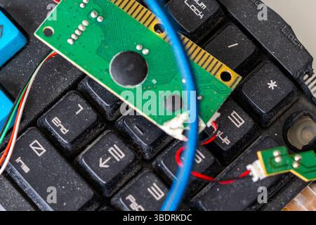 Computer keyboard. A broken, dirty, and dusty keyboard on a light background. High quality photo Stock Photo